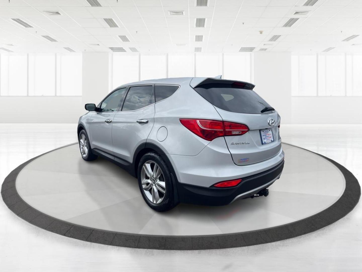 2013 Hyundai Santa Fe Sport 2.0T (5XYZW3LA3DG) with an Theta II 2L I-4 gasoline direct injection engine, located at 401 Woodman Dr, Riverside, OH, 45431, (937) 908-9800, 39.761024, -84.120956 - Photo#4