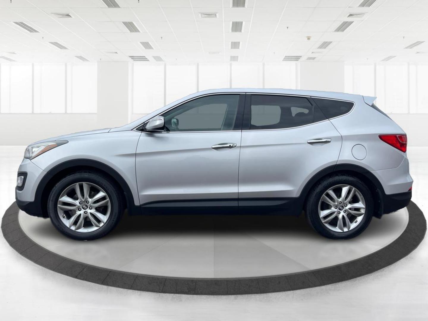 2013 Hyundai Santa Fe Sport 2.0T (5XYZW3LA3DG) with an Theta II 2L I-4 gasoline direct injection engine, located at 401 Woodman Dr, Riverside, OH, 45431, (937) 908-9800, 39.761024, -84.120956 - Photo#5