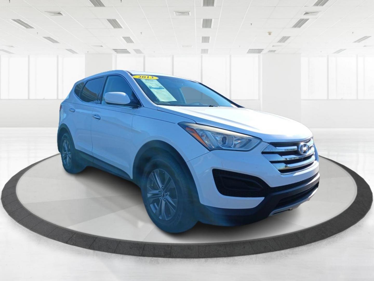 2013 Hyundai Santa Fe Sport 2.4 AWD (5XYZTDLB7DG) with an 2.4L L4 DOHC 16V engine, 6-Speed Automatic transmission, located at 1099 N County Rd 25A , Troy, OH, 45373, (937) 908-9800, 40.057041, -84.215462 - Photo#0