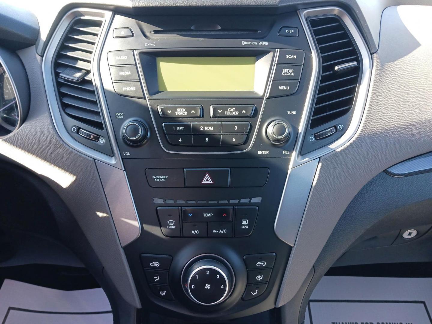 2013 Hyundai Santa Fe Sport 2.4 AWD (5XYZTDLB7DG) with an 2.4L L4 DOHC 16V engine, 6-Speed Automatic transmission, located at 1099 N County Rd 25A , Troy, OH, 45373, (937) 908-9800, 40.057041, -84.215462 - Photo#12