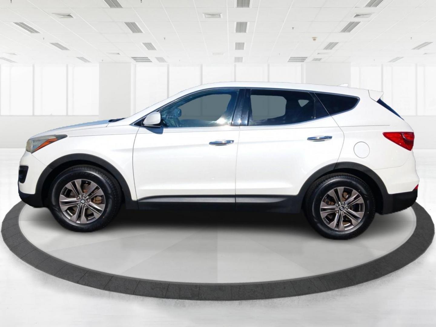 2013 Hyundai Santa Fe Sport 2.4 AWD (5XYZTDLB7DG) with an 2.4L L4 DOHC 16V engine, 6-Speed Automatic transmission, located at 1099 N County Rd 25A , Troy, OH, 45373, (937) 908-9800, 40.057041, -84.215462 - Photo#5