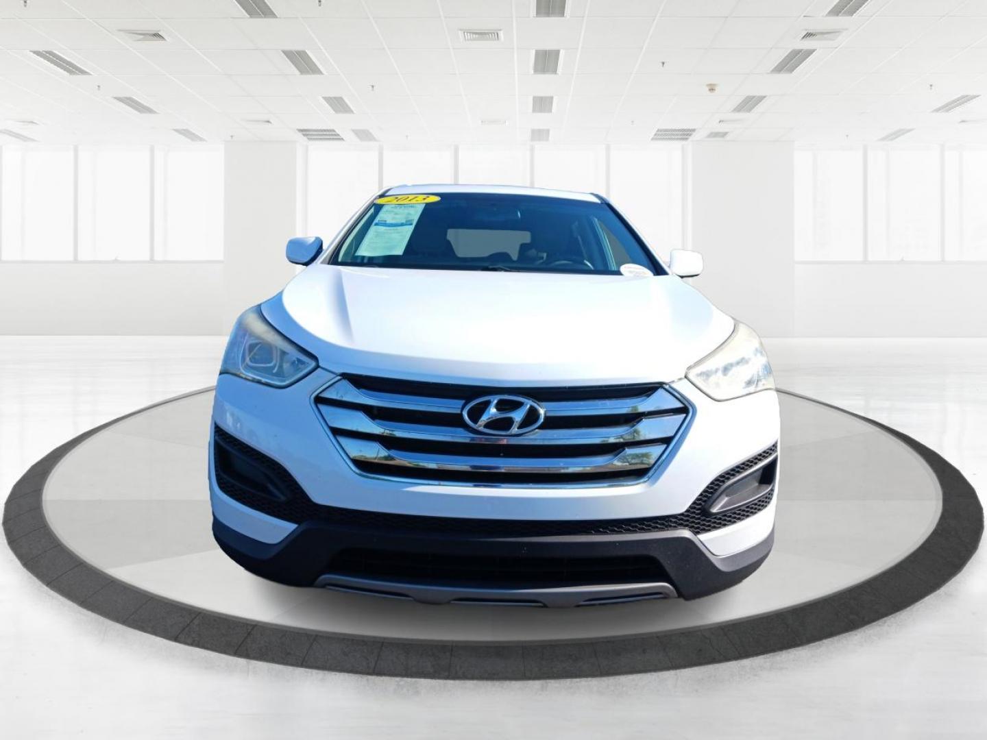 2013 Hyundai Santa Fe Sport 2.4 AWD (5XYZTDLB7DG) with an 2.4L L4 DOHC 16V engine, 6-Speed Automatic transmission, located at 1099 N County Rd 25A , Troy, OH, 45373, (937) 908-9800, 40.057041, -84.215462 - Photo#6