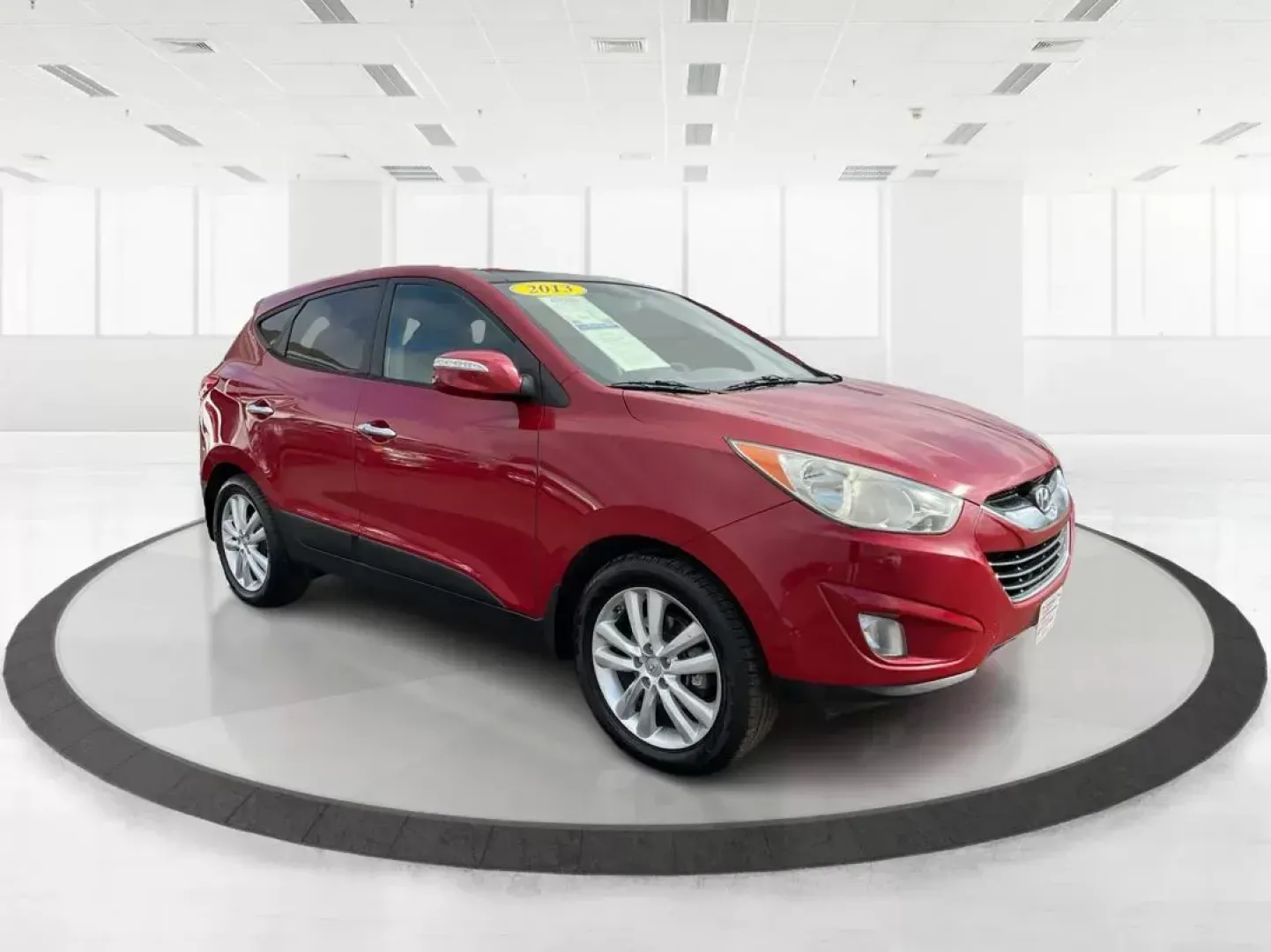 2013 Hyundai Tucson Limited (KM8JU3AC4DU) with an Theta II 2.4L I-4 DOHC engine, located at 1099 N County Rd 25A , Troy, OH, 45373, (937) 908-9800, 40.057041, -84.215462 - Photo#0