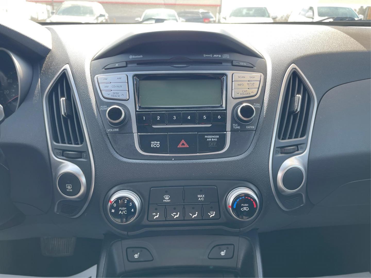 2013 Hyundai Tucson GLS (KM8JU3AC1DU) with an Theta II 2.4L I-4 DOHC engine, located at 1099 N County Rd 25A , Troy, OH, 45373, (937) 908-9800, 40.057041, -84.215462 - Photo#12