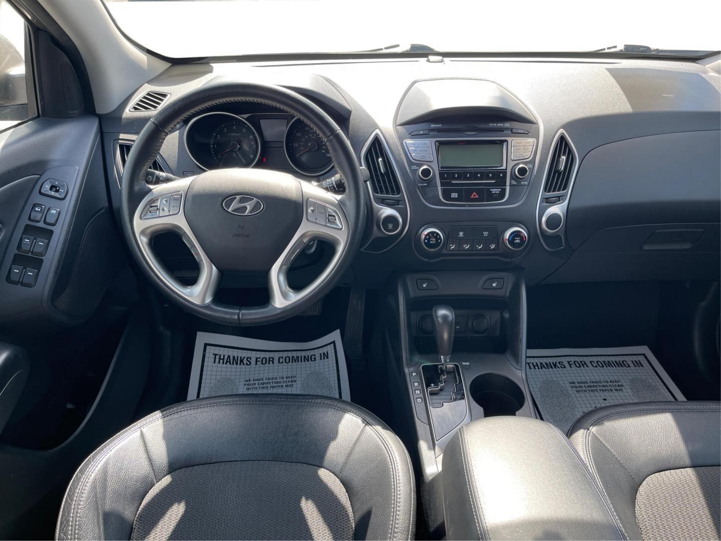 2013 Hyundai Tucson GLS (KM8JU3AC1DU) with an Theta II 2.4L I-4 DOHC engine, located at 1099 N County Rd 25A , Troy, OH, 45373, (937) 908-9800, 40.057041, -84.215462 - Photo#20
