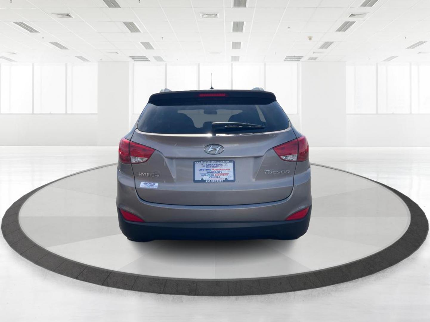 2013 Hyundai Tucson GLS (KM8JU3AC1DU) with an Theta II 2.4L I-4 DOHC engine, located at 1099 N County Rd 25A , Troy, OH, 45373, (937) 908-9800, 40.057041, -84.215462 - Photo#3