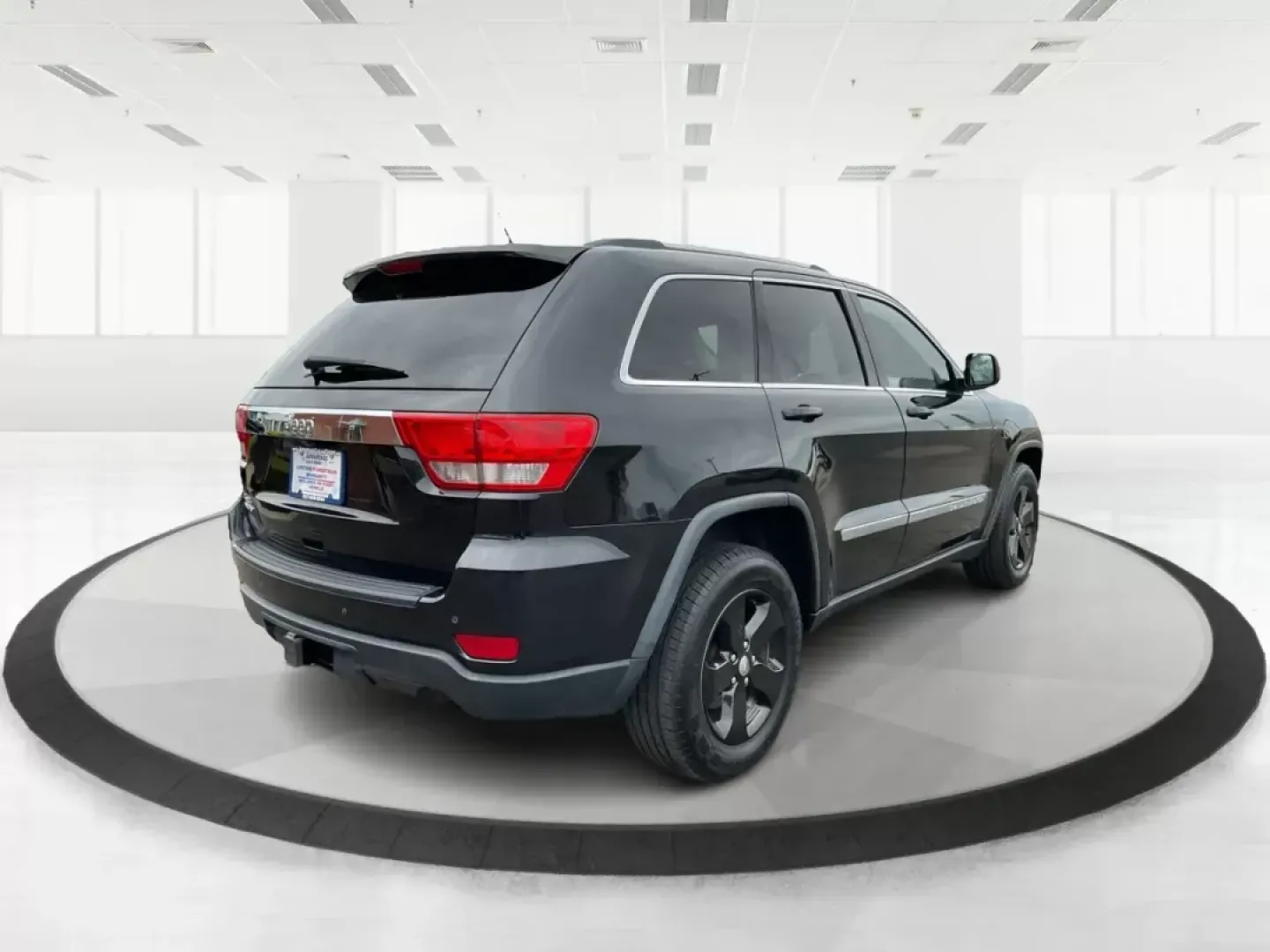 2013 Jeep Grand Cherokee Laredo (1C4RJFAGXDC) with an Other engine, located at 8750 N County Rd 25A, Piqua, OH, 45356, (937) 908-9800, 40.164391, -84.232513 - Photo#2