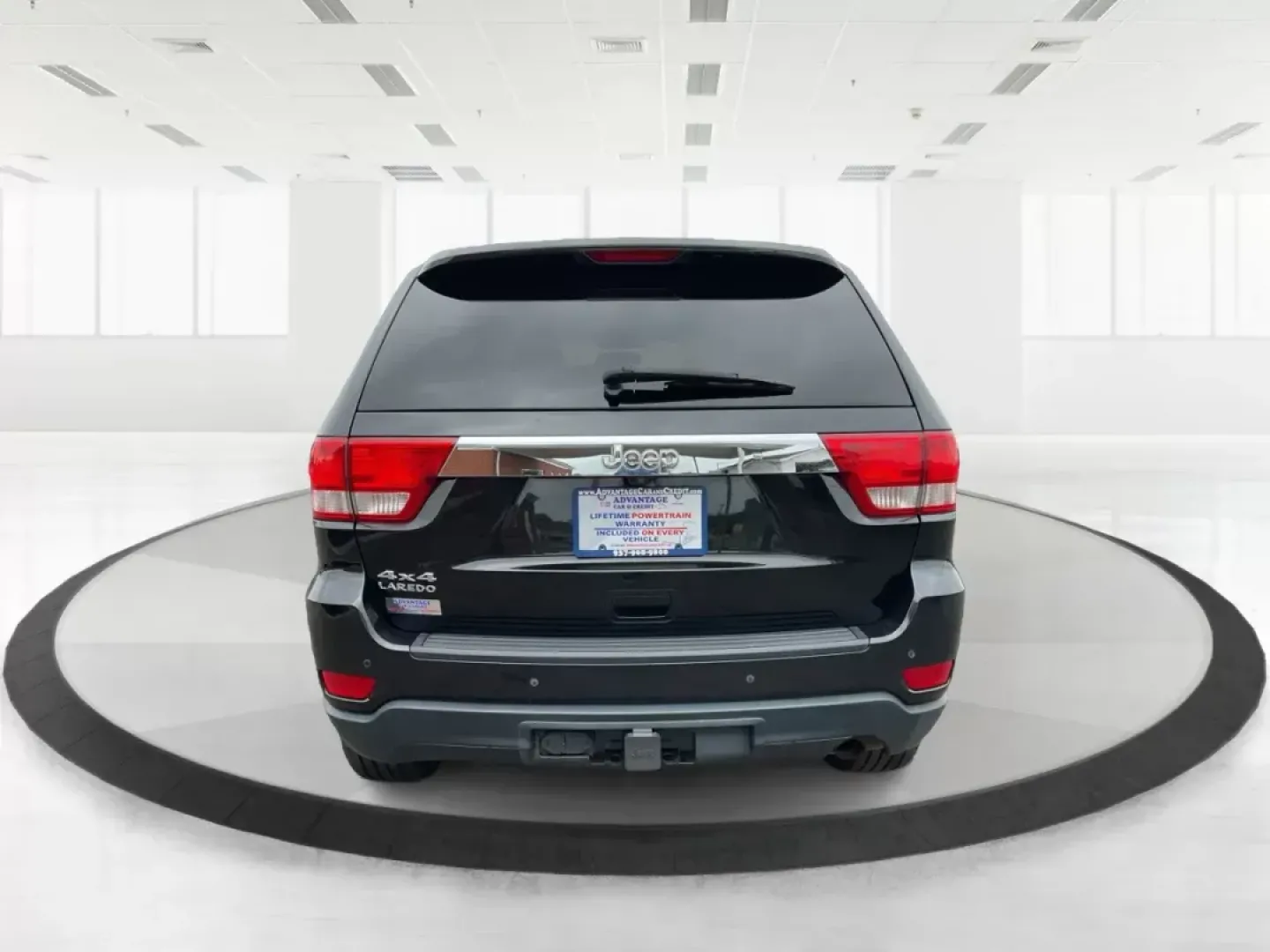 2013 Jeep Grand Cherokee Laredo (1C4RJFAGXDC) with an Other engine, located at 8750 N County Rd 25A, Piqua, OH, 45356, (937) 908-9800, 40.164391, -84.232513 - Photo#4