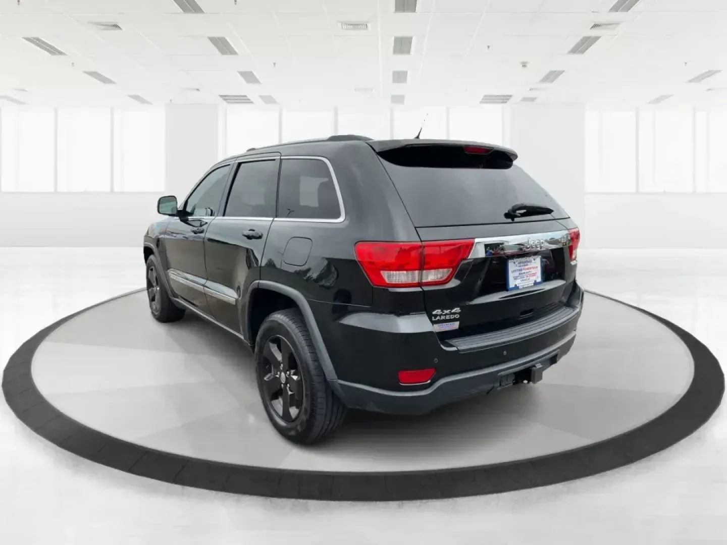 2013 Jeep Grand Cherokee Laredo (1C4RJFAGXDC) with an Other engine, located at 8750 N County Rd 25A, Piqua, OH, 45356, (937) 908-9800, 40.164391, -84.232513 - Photo#5