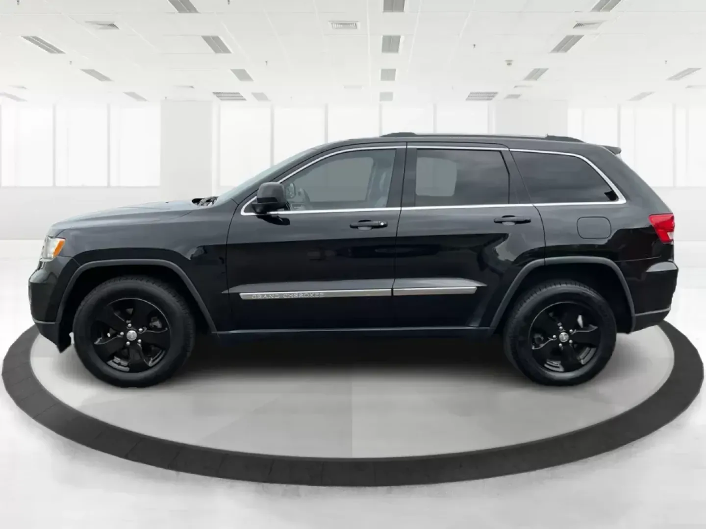 2013 Jeep Grand Cherokee Laredo (1C4RJFAGXDC) with an Other engine, located at 8750 N County Rd 25A, Piqua, OH, 45356, (937) 908-9800, 40.164391, -84.232513 - Photo#6