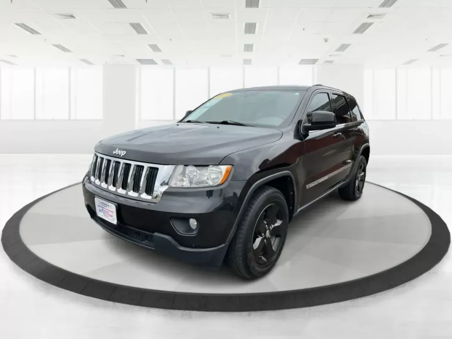2013 Jeep Grand Cherokee Laredo (1C4RJFAGXDC) with an Other engine, located at 8750 N County Rd 25A, Piqua, OH, 45356, (937) 908-9800, 40.164391, -84.232513 - Photo#8