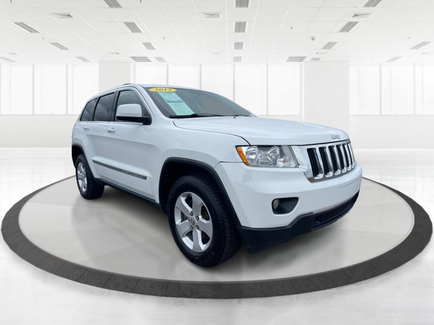 2013 Jeep Grand Cherokee Laredo (1C4RJFAG8DC) with an 3.6L V-6 DOHC engine, located at 1951 S Dayton Lakeview Rd., New Carlisle, OH, 45344, (937) 908-9800, 39.890999, -84.050255 - Photo#0