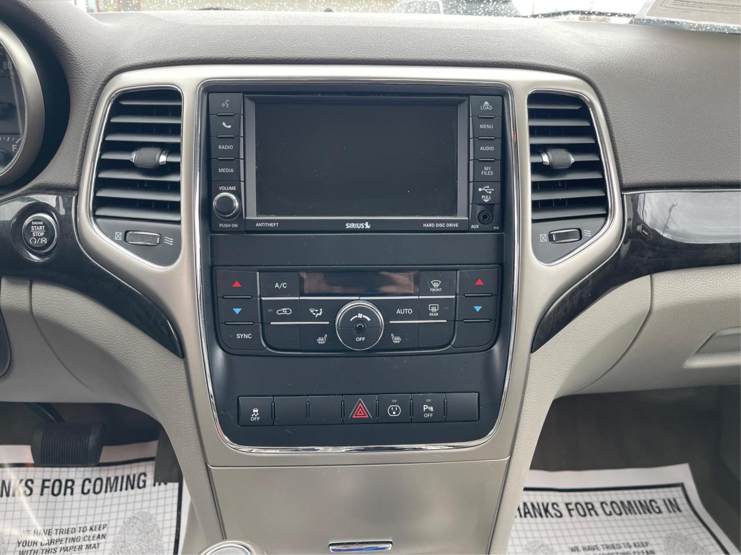 2013 Jeep Grand Cherokee Laredo (1C4RJFAG8DC) with an 3.6L V-6 DOHC engine, located at 1951 S Dayton Lakeview Rd., New Carlisle, OH, 45344, (937) 908-9800, 39.890999, -84.050255 - Photo#12