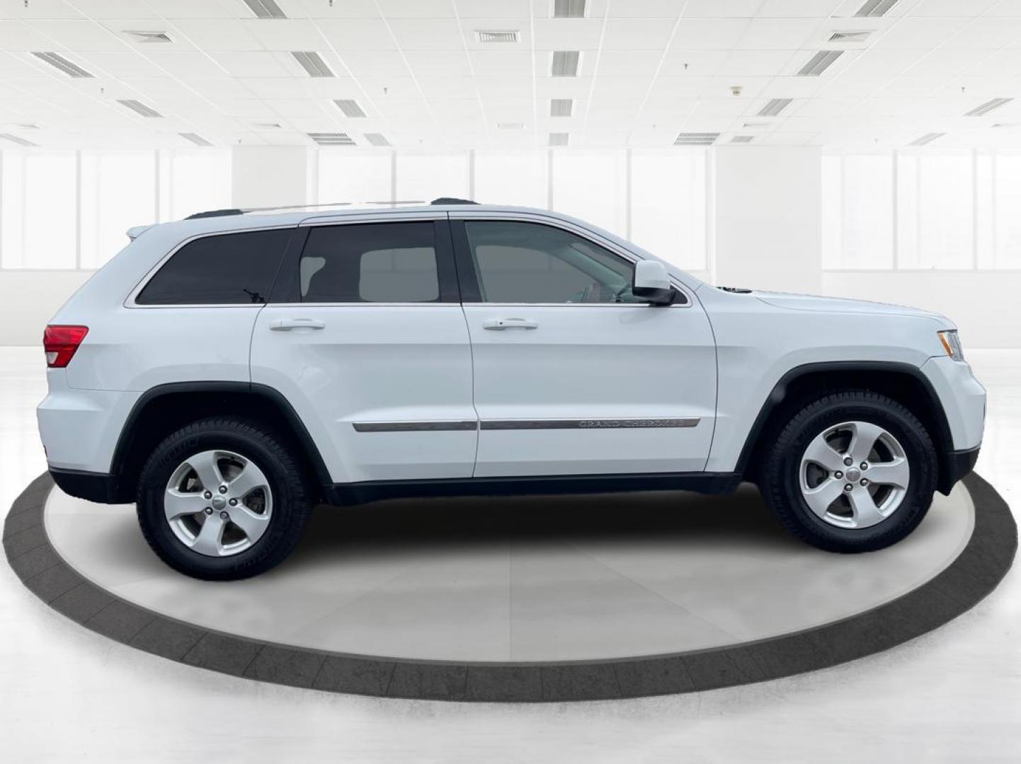 2013 Jeep Grand Cherokee Laredo (1C4RJFAG8DC) with an 3.6L V-6 DOHC engine, located at 1951 S Dayton Lakeview Rd., New Carlisle, OH, 45344, (937) 908-9800, 39.890999, -84.050255 - Photo#1