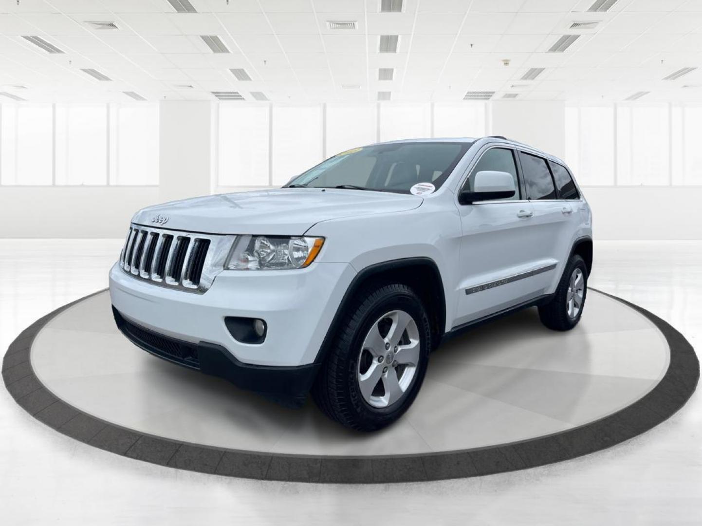 2013 Jeep Grand Cherokee Laredo (1C4RJFAG8DC) with an 3.6L V-6 DOHC engine, located at 1951 S Dayton Lakeview Rd., New Carlisle, OH, 45344, (937) 908-9800, 39.890999, -84.050255 - Photo#7