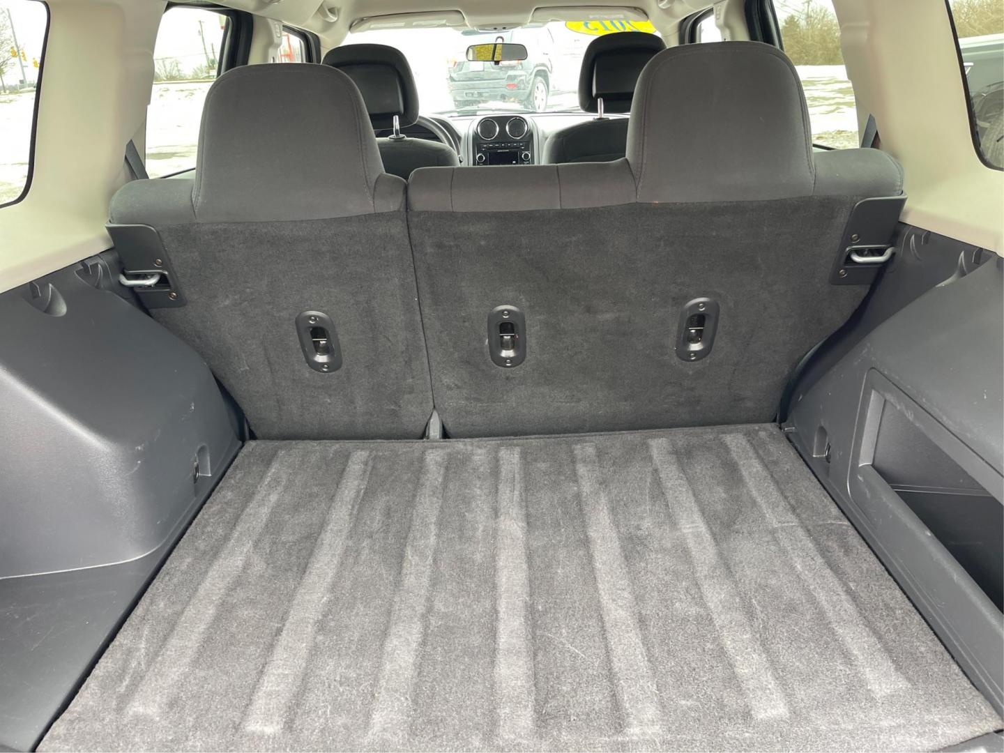 2013 Jeep Patriot Sport 4WD (1C4NJRBBXDD) with an 2.4L L4 DOHC 16V engine, located at 401 Woodman Dr, Riverside, OH, 45431, (937) 908-9800, 39.761024, -84.120956 - Photo#11