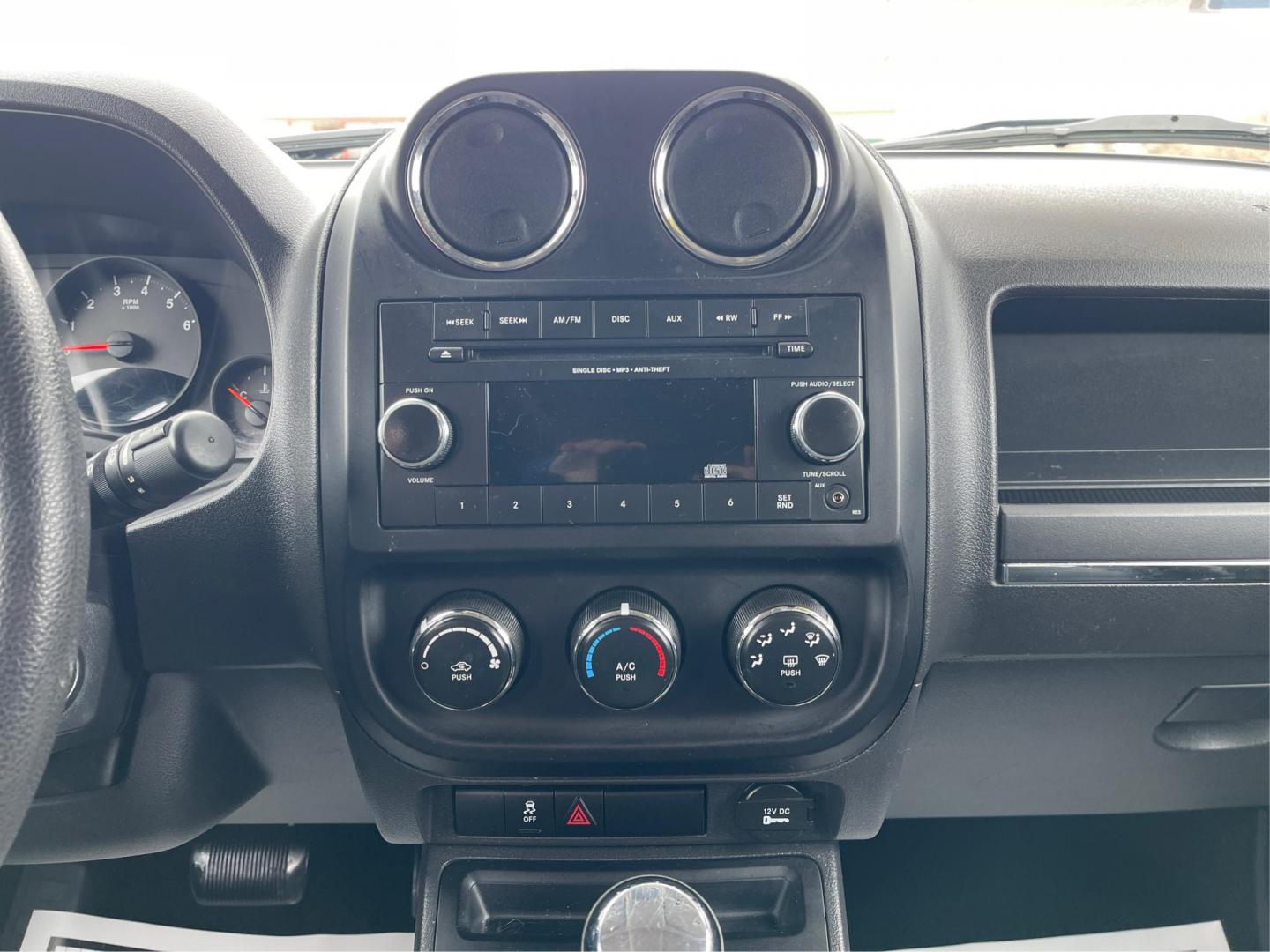2013 Jeep Patriot Sport 4WD (1C4NJRBBXDD) with an 2.4L L4 DOHC 16V engine, located at 401 Woodman Dr, Riverside, OH, 45431, (937) 908-9800, 39.761024, -84.120956 - Photo#12