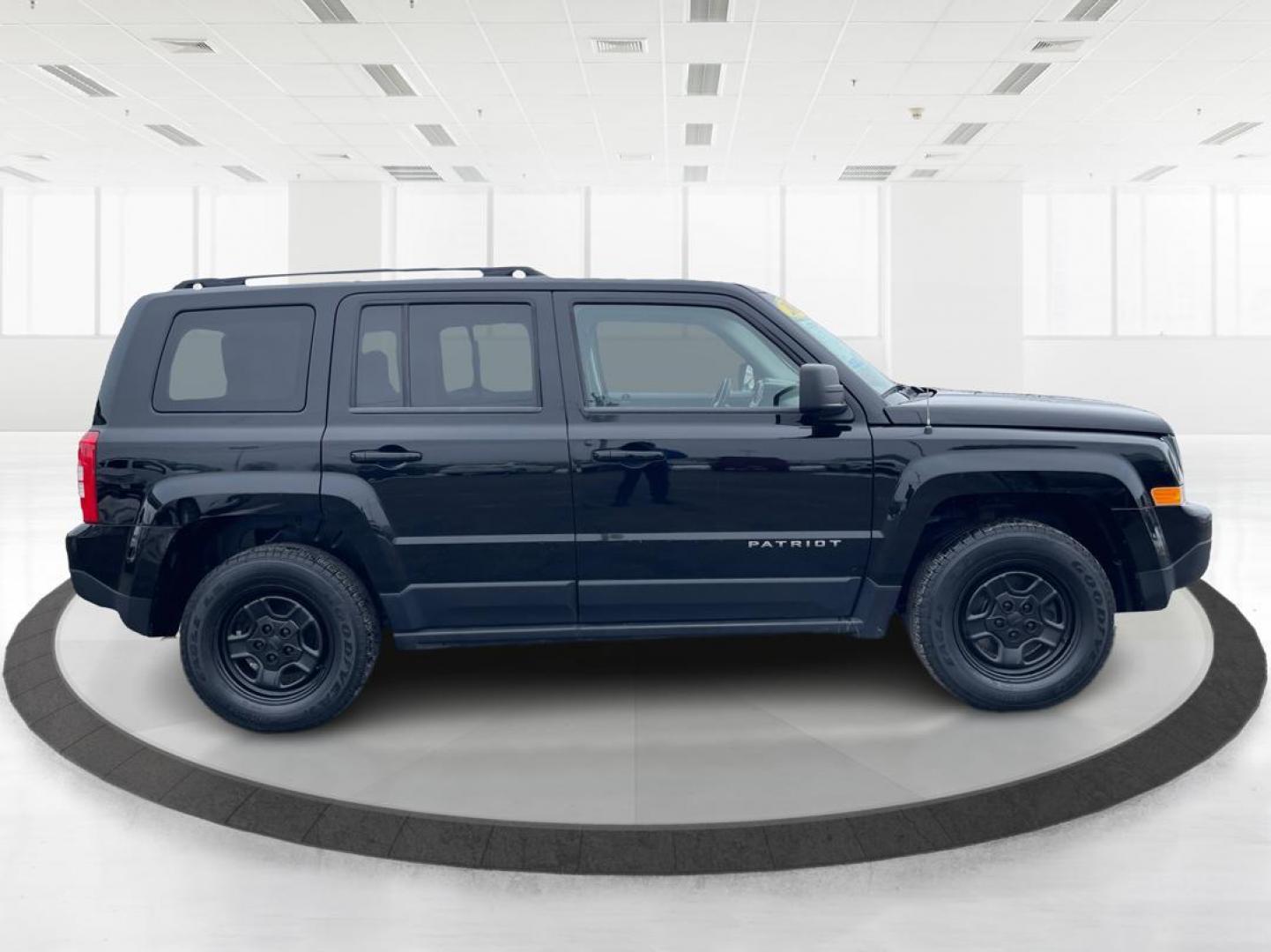 2013 Jeep Patriot Sport 4WD (1C4NJRBBXDD) with an 2.4L L4 DOHC 16V engine, located at 401 Woodman Dr, Riverside, OH, 45431, (937) 908-9800, 39.761024, -84.120956 - Photo#1