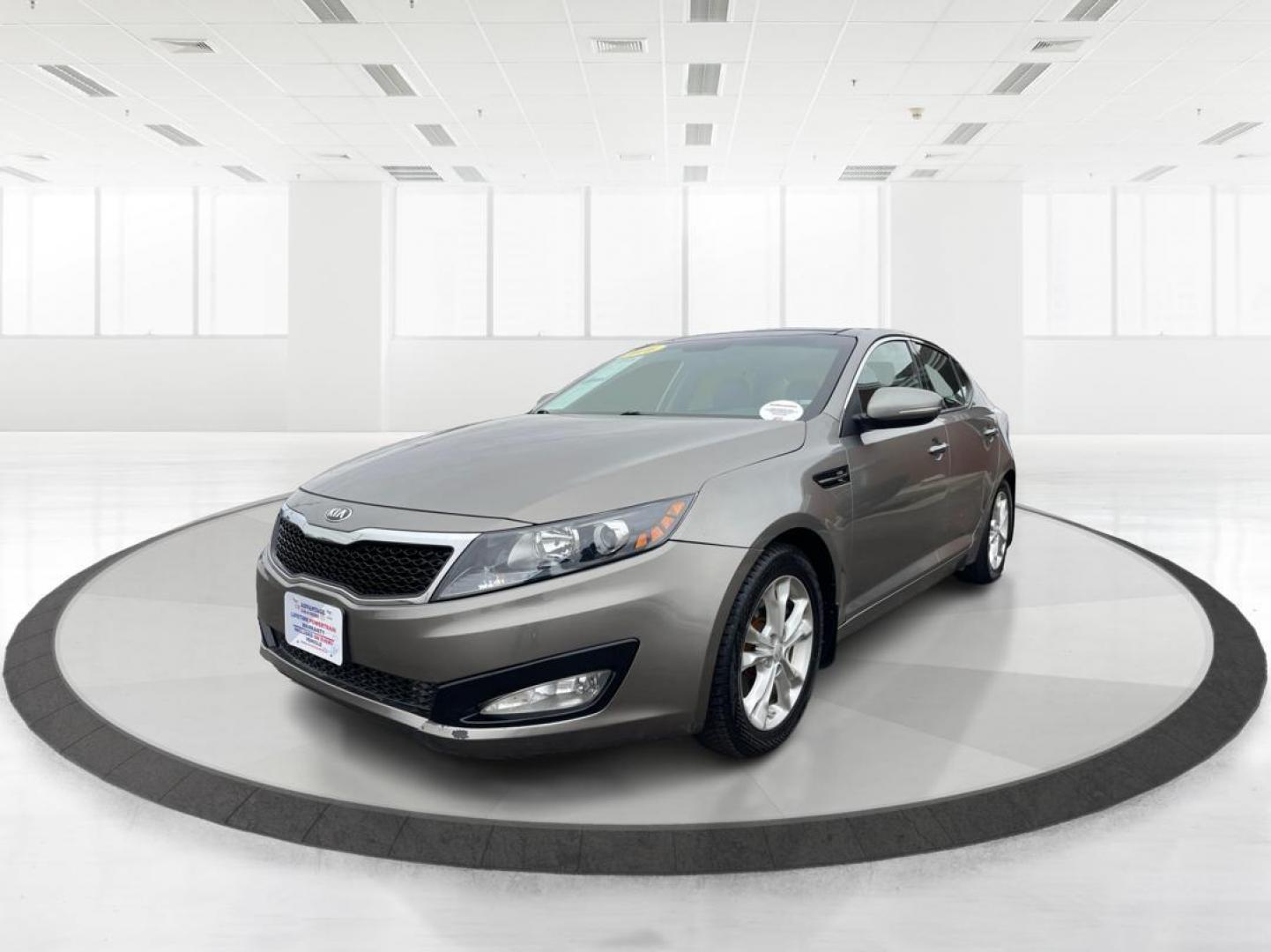 2013 Kia Optima EX (5XXGN4A76DG) with an Other engine, located at 1184 Kauffman Ave, Fairborn, OH, 45324, (937) 908-9800, 39.807072, -84.031563 - Photo#7