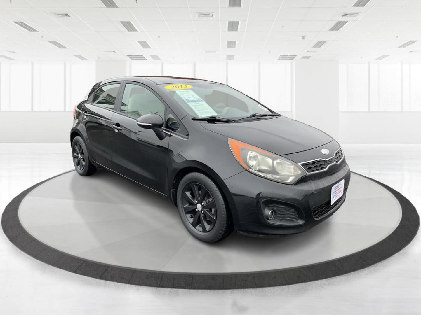 2013 Kia Rio EX (KNADN5A30D6) with an 1.6L I-4 gasoline direct injection engine, located at 1951 S Dayton Lakeview Rd., New Carlisle, OH, 45344, (937) 908-9800, 39.890999, -84.050255 - Photo#0