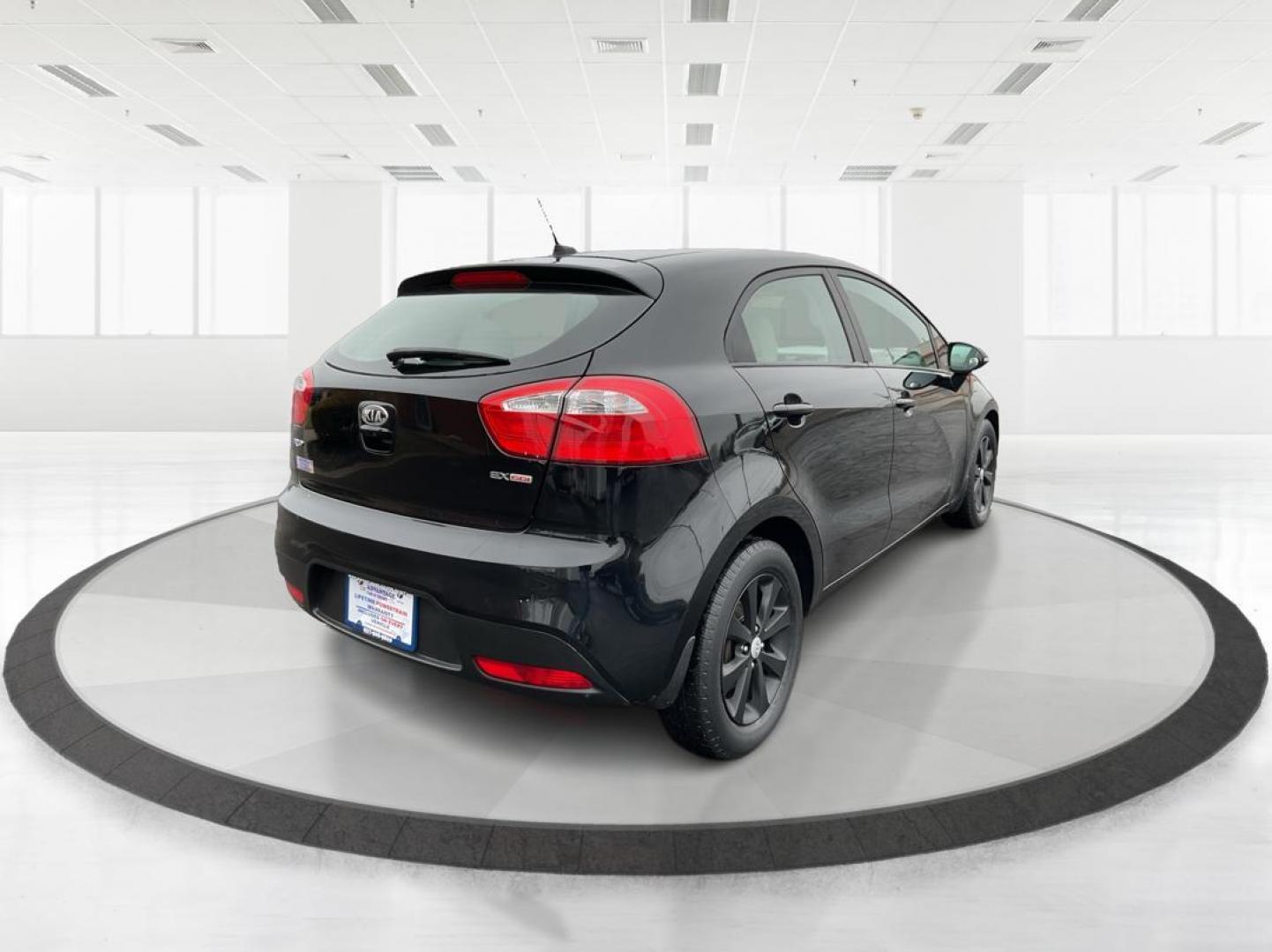 2013 Kia Rio EX (KNADN5A30D6) with an 1.6L I-4 gasoline direct injection engine, located at 1951 S Dayton Lakeview Rd., New Carlisle, OH, 45344, (937) 908-9800, 39.890999, -84.050255 - Photo#2