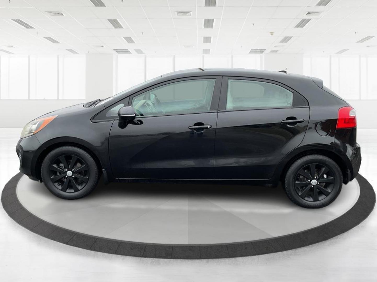 2013 Kia Rio EX (KNADN5A30D6) with an 1.6L I-4 gasoline direct injection engine, located at 1951 S Dayton Lakeview Rd., New Carlisle, OH, 45344, (937) 908-9800, 39.890999, -84.050255 - Photo#5
