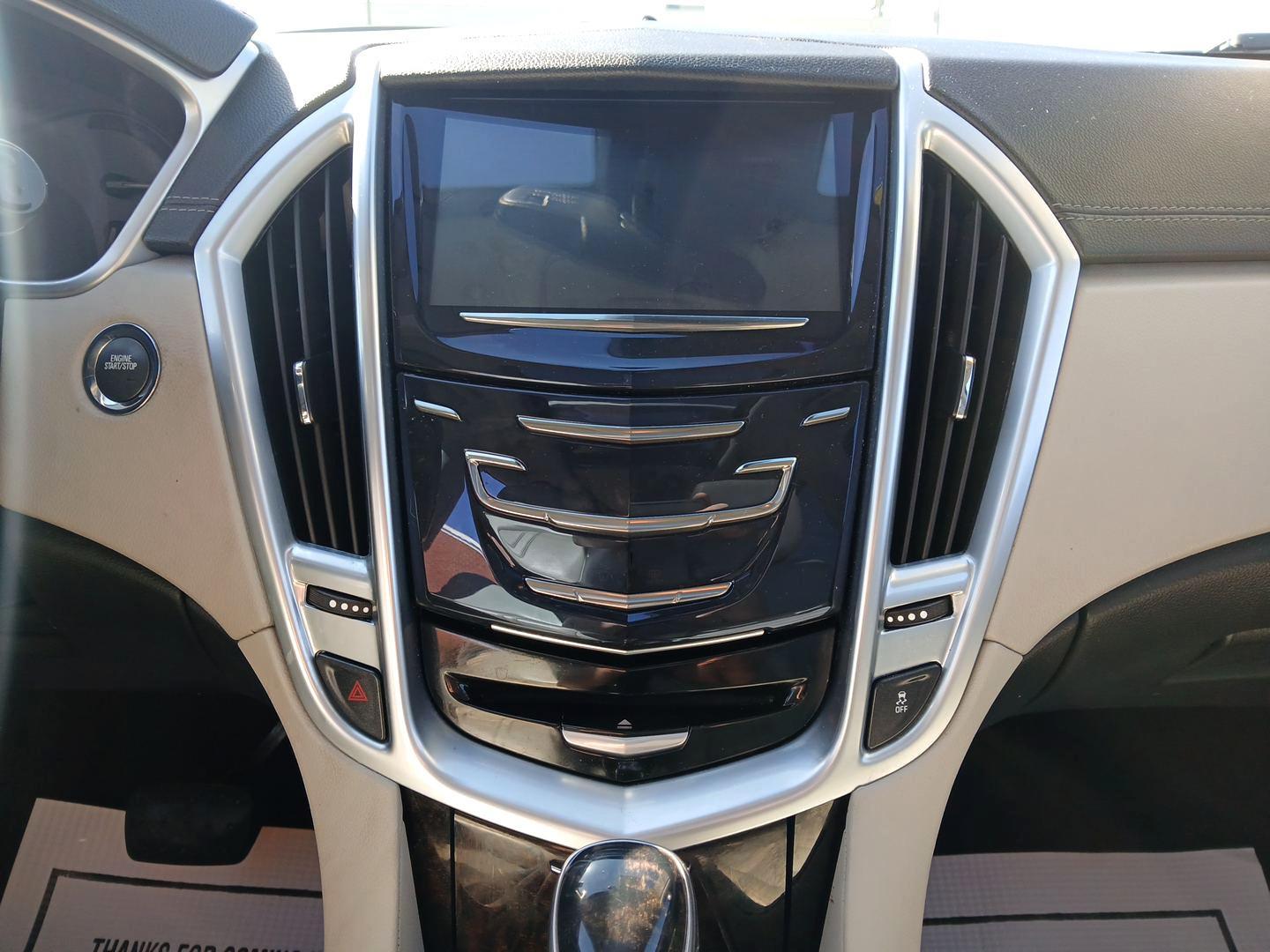 2014 Cadillac SRX Luxury Collection AWD (3GYFNEE30ES) with an 3.6L V6 DOHC 24V FFV engine, 6-Speed Automatic transmission, located at 880 E. National Road, OH, 45377, (937) 908-9800, 39.891918, -84.183975 - Photo#12