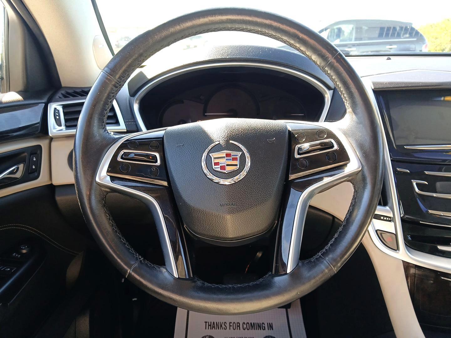 2014 Cadillac SRX Luxury Collection AWD (3GYFNEE30ES) with an 3.6L V6 DOHC 24V FFV engine, 6-Speed Automatic transmission, located at 880 E. National Road, OH, 45377, (937) 908-9800, 39.891918, -84.183975 - Photo#15
