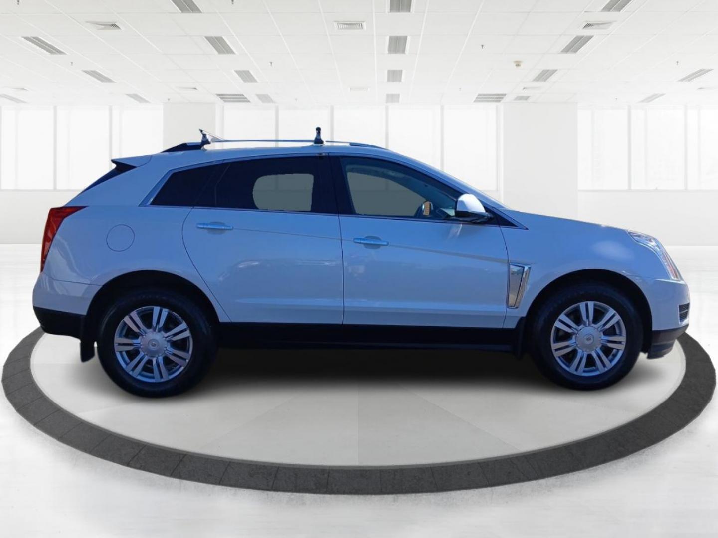 2014 Cadillac SRX Luxury Collection AWD (3GYFNEE30ES) with an 3.6L V6 DOHC 24V FFV engine, 6-Speed Automatic transmission, located at 880 E. National Road, OH, 45377, (937) 908-9800, 39.891918, -84.183975 - Photo#1