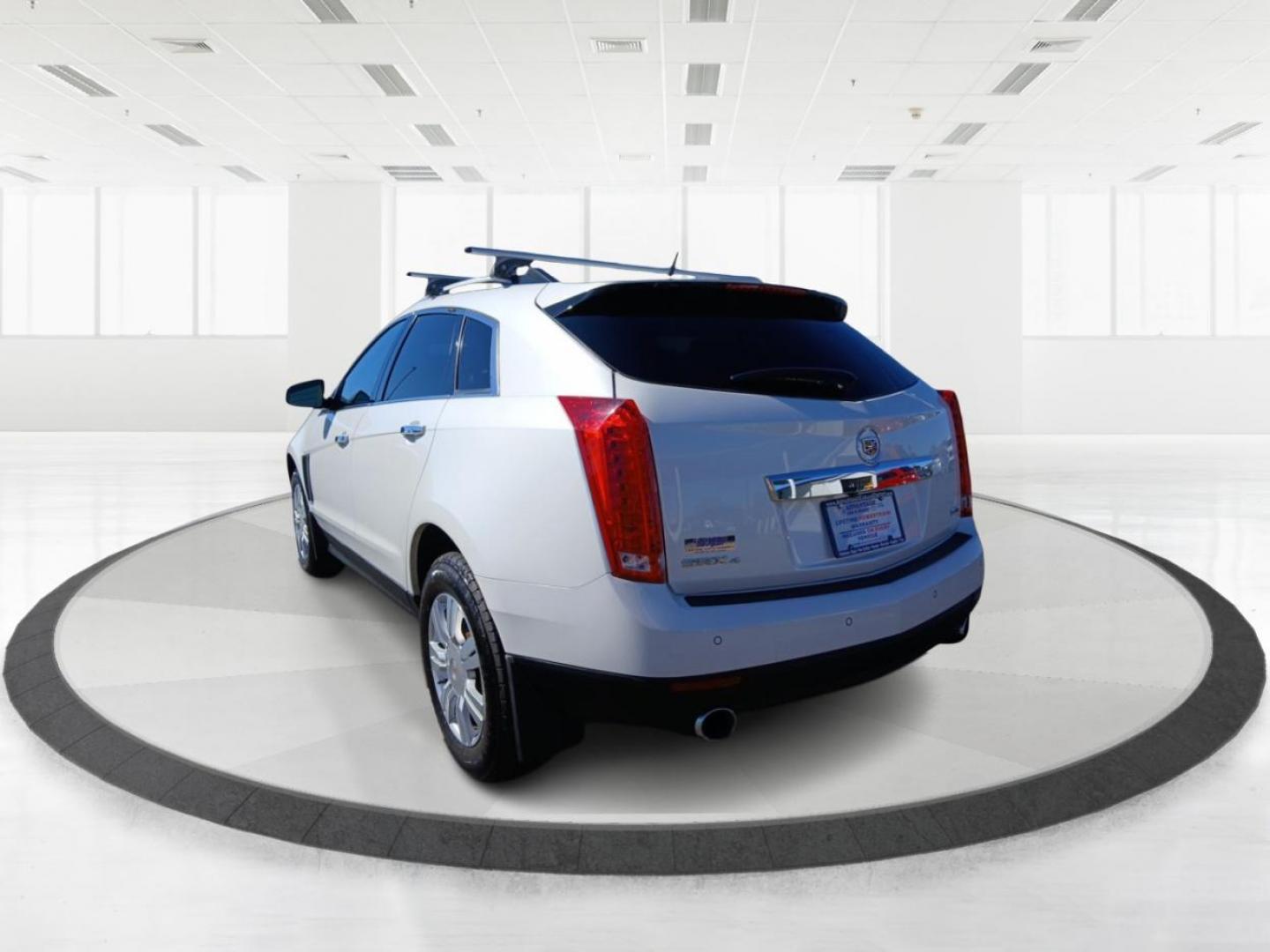 2014 Cadillac SRX Luxury Collection AWD (3GYFNEE30ES) with an 3.6L V6 DOHC 24V FFV engine, 6-Speed Automatic transmission, located at 880 E. National Road, OH, 45377, (937) 908-9800, 39.891918, -84.183975 - Photo#4