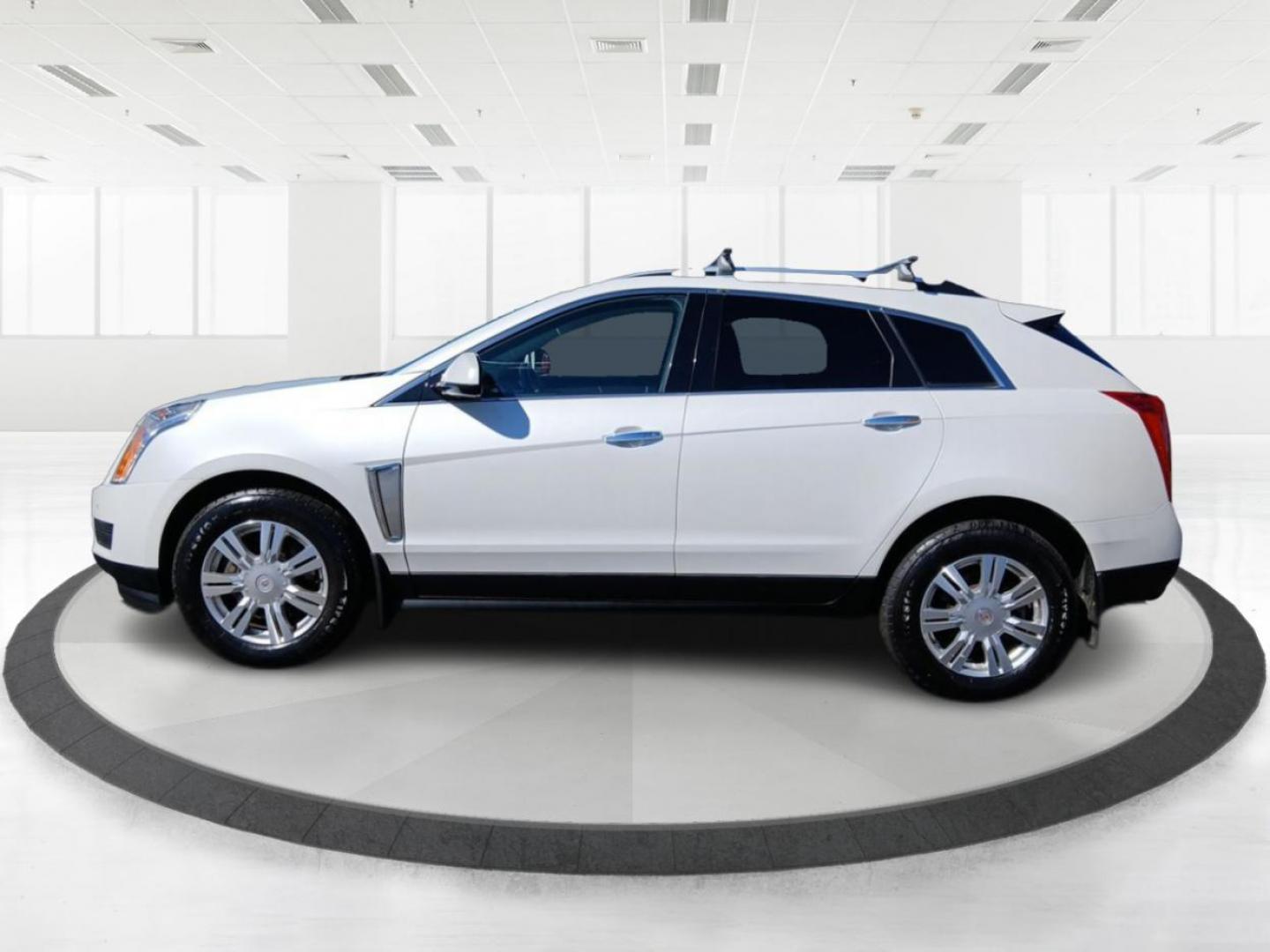 2014 Cadillac SRX Luxury Collection AWD (3GYFNEE30ES) with an 3.6L V6 DOHC 24V FFV engine, 6-Speed Automatic transmission, located at 880 E. National Road, OH, 45377, (937) 908-9800, 39.891918, -84.183975 - Photo#5
