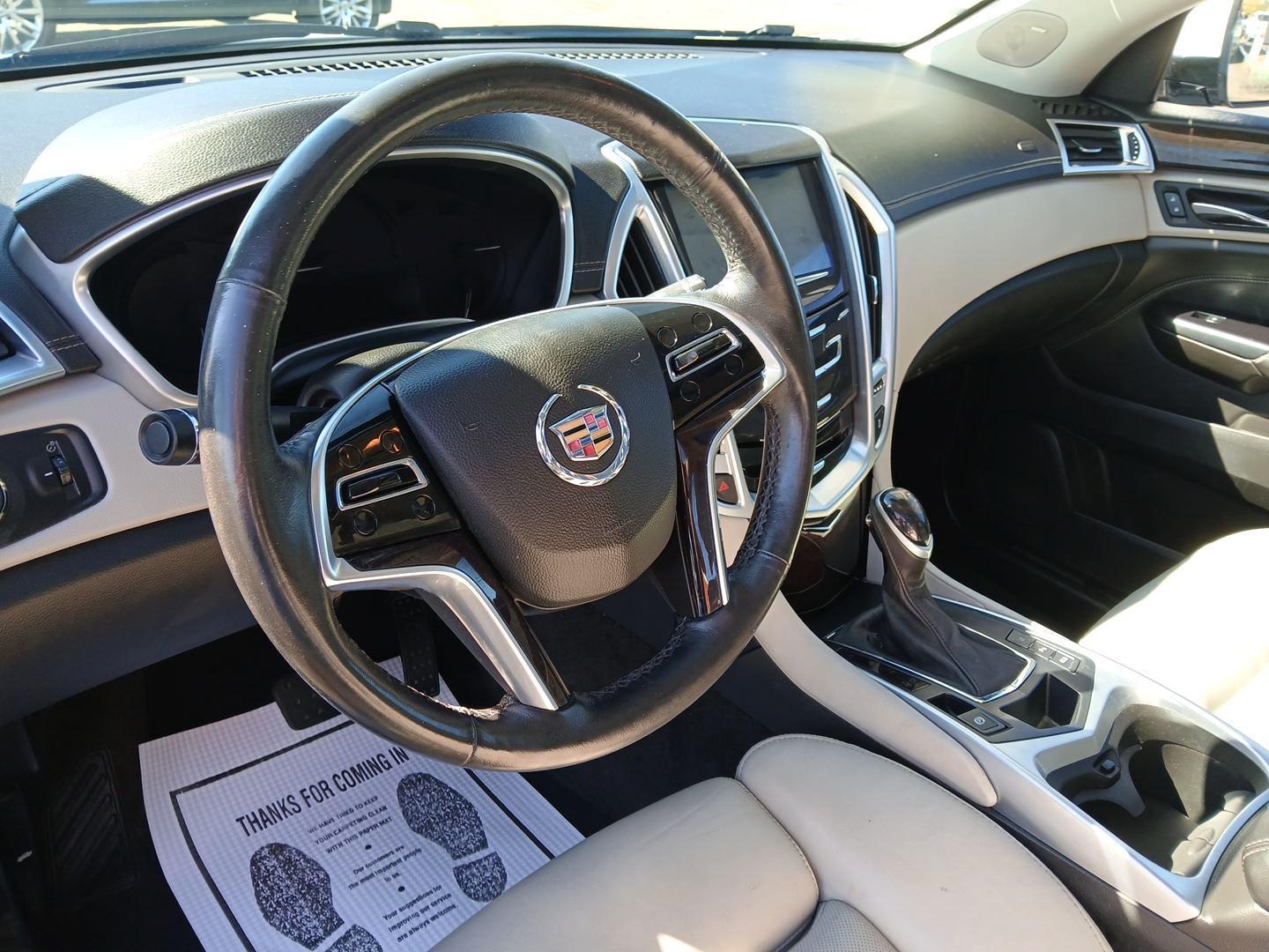 2014 Cadillac SRX Luxury Collection AWD (3GYFNEE30ES) with an 3.6L V6 DOHC 24V FFV engine, 6-Speed Automatic transmission, located at 880 E. National Road, OH, 45377, (937) 908-9800, 39.891918, -84.183975 - Photo#8