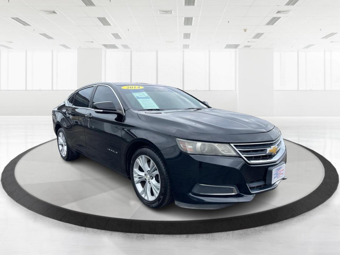 2014 Black Chevrolet Impala 2LT (2G1125S32E9) with an 3.6L V6 DOHC 24VV FFV engine, 6-Speed Automatic transmission, located at 1099 N County Rd 25A , Troy, OH, 45373, (937) 908-9800, 40.057041, -84.215462 - Photo#0