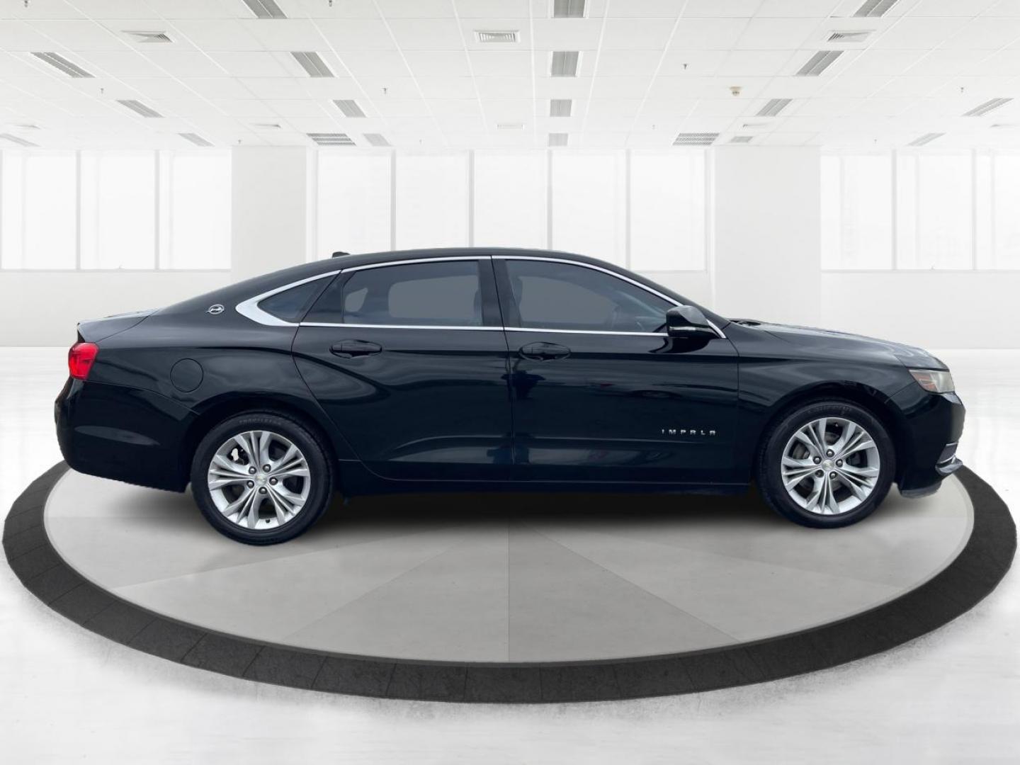 2014 Black Chevrolet Impala 2LT (2G1125S32E9) with an 3.6L V6 DOHC 24VV FFV engine, 6-Speed Automatic transmission, located at 1099 N County Rd 25A , Troy, OH, 45373, (937) 908-9800, 40.057041, -84.215462 - Photo#1