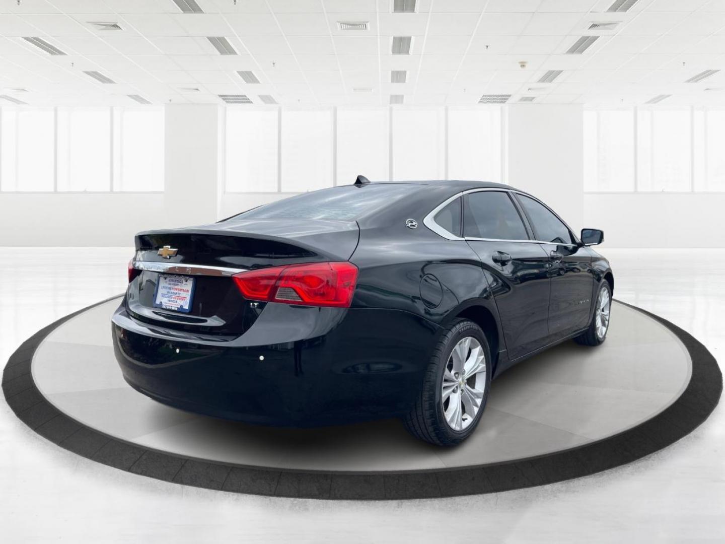 2014 Black Chevrolet Impala 2LT (2G1125S32E9) with an 3.6L V6 DOHC 24VV FFV engine, 6-Speed Automatic transmission, located at 1099 N County Rd 25A , Troy, OH, 45373, (937) 908-9800, 40.057041, -84.215462 - Photo#2