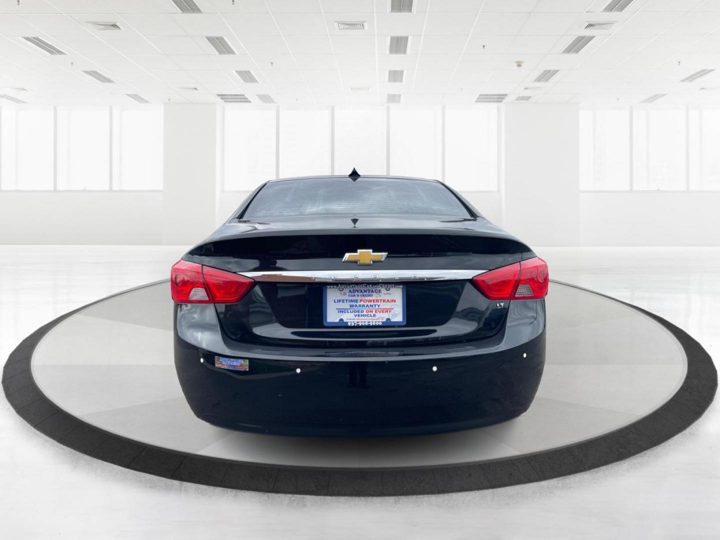 2014 Black Chevrolet Impala 2LT (2G1125S32E9) with an 3.6L V6 DOHC 24VV FFV engine, 6-Speed Automatic transmission, located at 1099 N County Rd 25A , Troy, OH, 45373, (937) 908-9800, 40.057041, -84.215462 - Photo#3