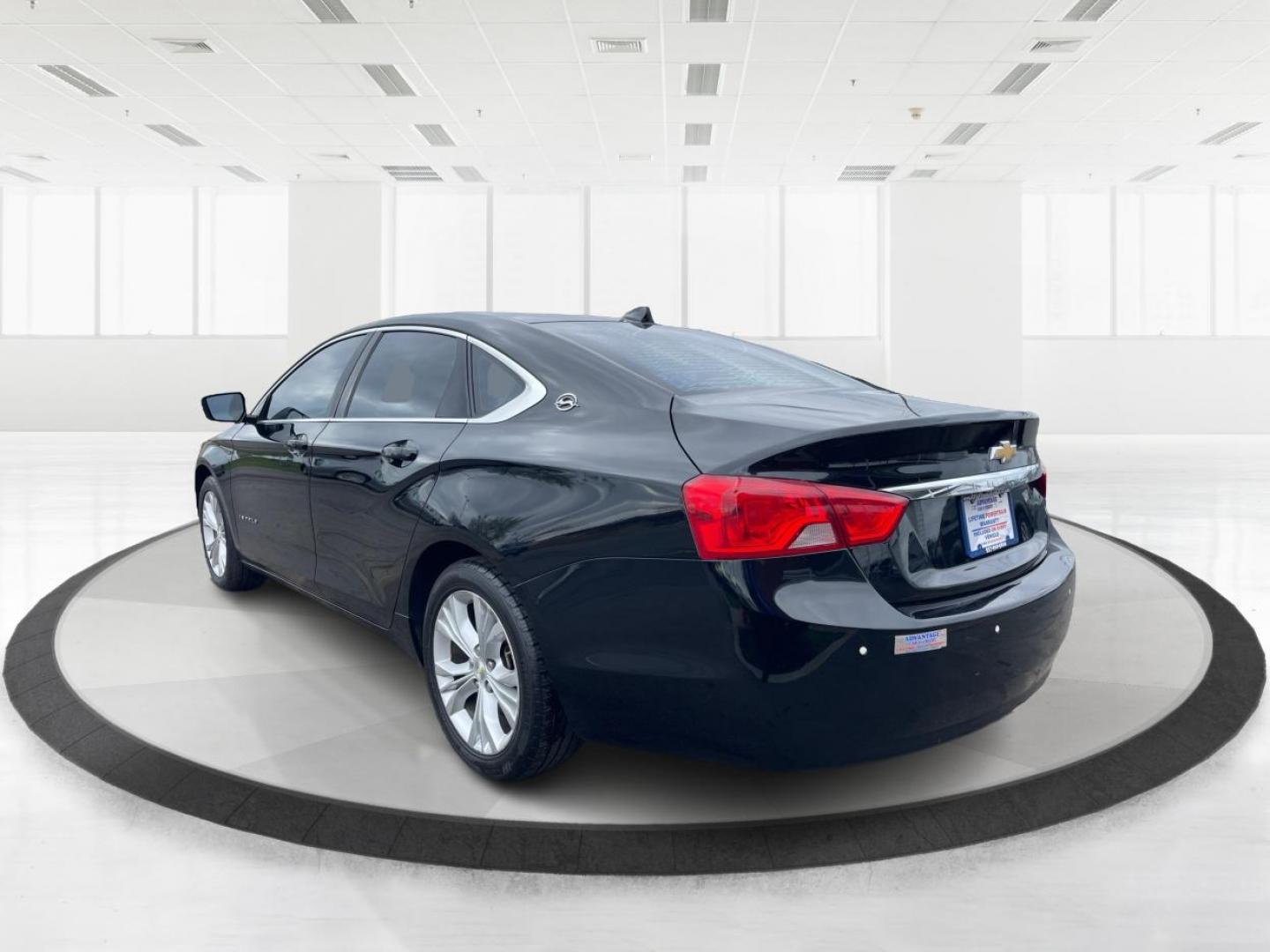 2014 Black Chevrolet Impala 2LT (2G1125S32E9) with an 3.6L V6 DOHC 24VV FFV engine, 6-Speed Automatic transmission, located at 1099 N County Rd 25A , Troy, OH, 45373, (937) 908-9800, 40.057041, -84.215462 - Photo#4