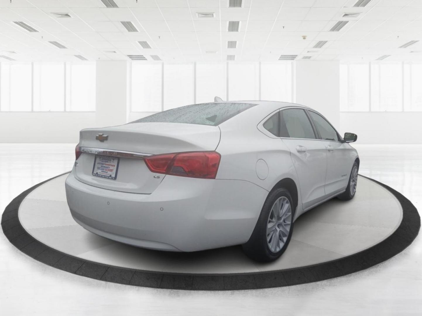2014 Chevrolet Impala LS (2G11Y5SLXE9) with an 2.5L L4 DOHC 16V engine, 6-Speed Automatic transmission, located at 1099 N County Rd 25A , Troy, OH, 45373, (937) 908-9800, 40.057041, -84.215462 - Photo#2
