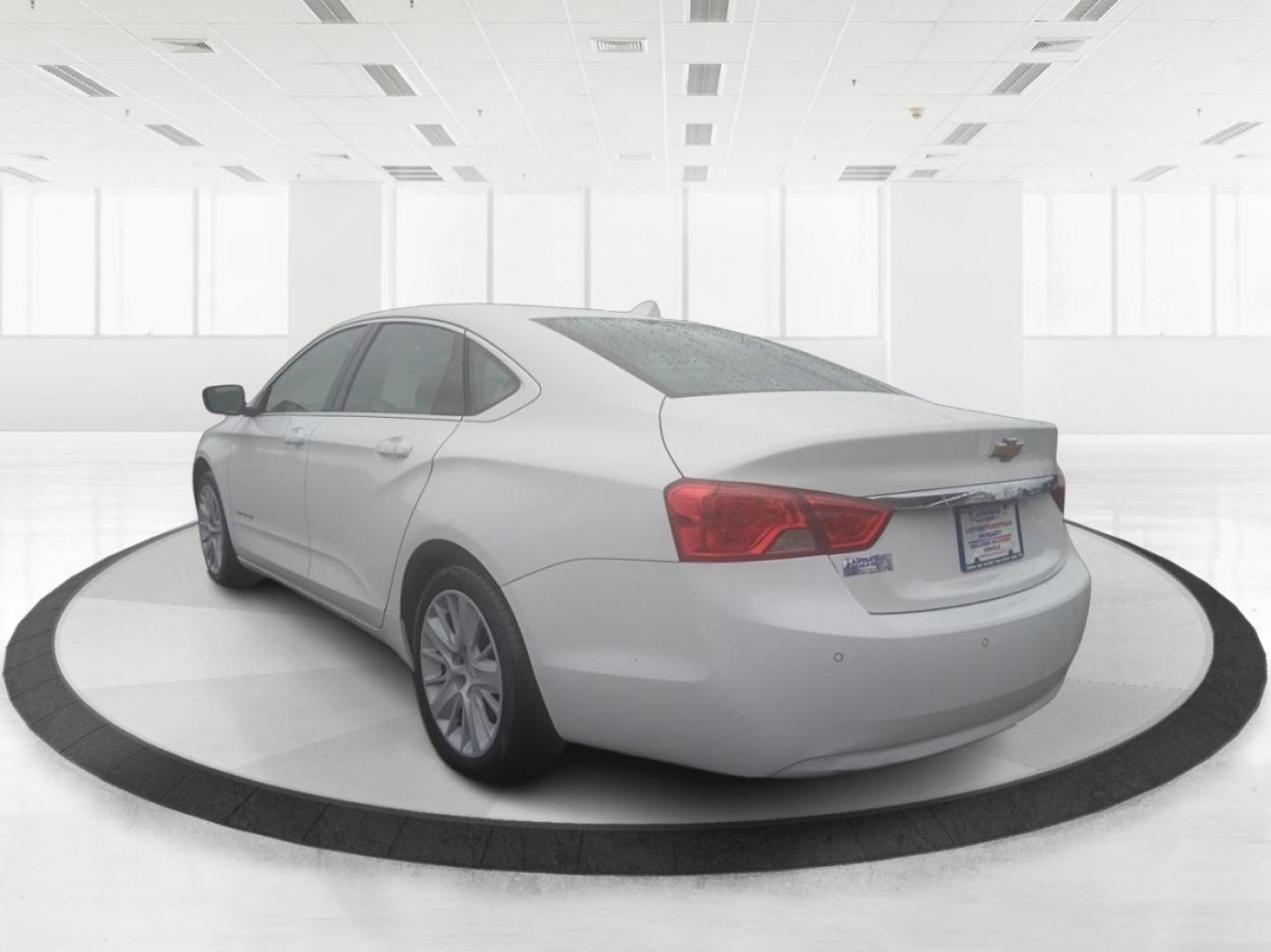 2014 Chevrolet Impala LS (2G11Y5SLXE9) with an 2.5L L4 DOHC 16V engine, 6-Speed Automatic transmission, located at 1099 N County Rd 25A , Troy, OH, 45373, (937) 908-9800, 40.057041, -84.215462 - Photo#4