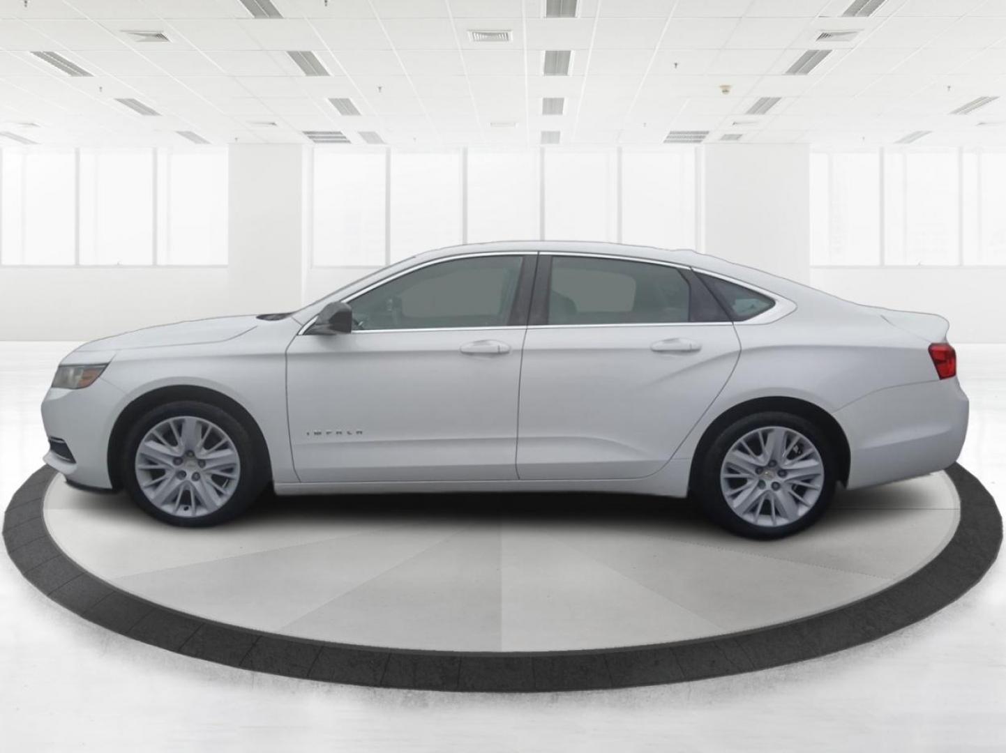 2014 Chevrolet Impala LS (2G11Y5SLXE9) with an 2.5L L4 DOHC 16V engine, 6-Speed Automatic transmission, located at 1099 N County Rd 25A , Troy, OH, 45373, (937) 908-9800, 40.057041, -84.215462 - Photo#5