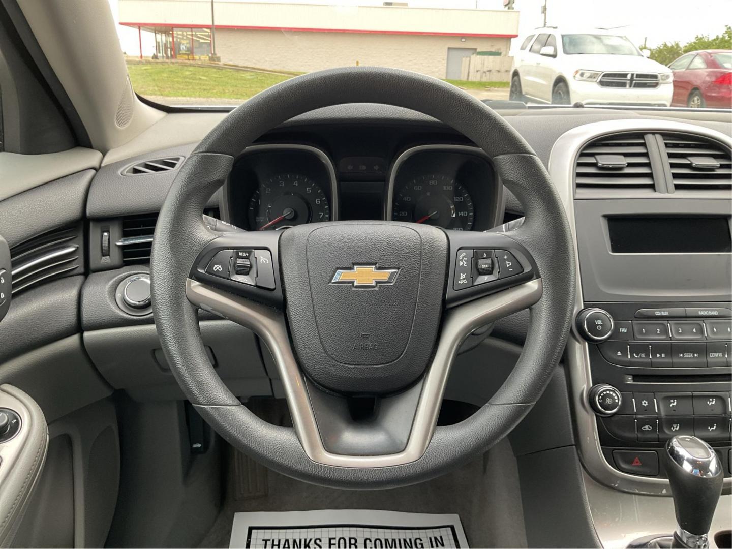 2014 Chevrolet Malibu 1LS (1G11B5SL5EU) with an ECOTEC 2.5L I-4 gasoline direct injection engine, located at 1184 Kauffman Ave, Fairborn, OH, 45324, (937) 908-9800, 39.807072, -84.031563 - Photo#12