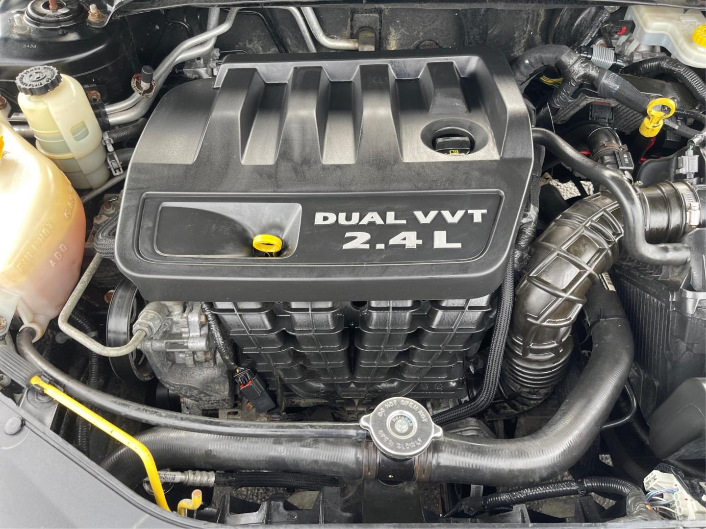 2014 Dodge Avenger SE (1C3CDZAB9EN) with an 2.4L L4 DOHC 16V engine, 4-Speed Automatic transmission, located at 880 E. National Road, OH, 45377, (937) 908-9800, 39.891918, -84.183975 - Photo#10