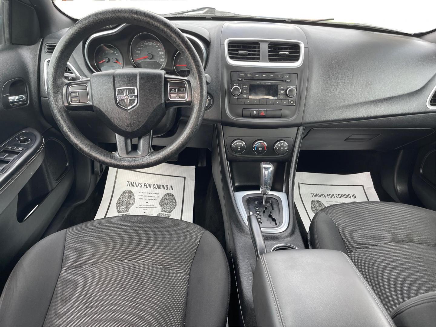 2014 Dodge Avenger SE (1C3CDZAB9EN) with an 2.4L L4 DOHC 16V engine, 4-Speed Automatic transmission, located at 880 E. National Road, OH, 45377, (937) 908-9800, 39.891918, -84.183975 - Photo#19