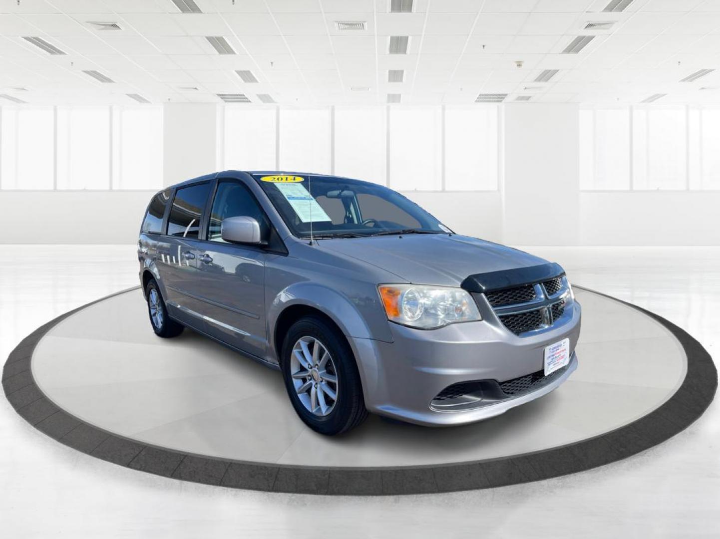 2014 Dodge Grand Caravan SXT (2C4RDGCG4ER) with an 3.6L V-6 DOHC engine, located at 1951 S Dayton Lakeview Rd., New Carlisle, OH, 45344, (937) 908-9800, 39.890999, -84.050255 - Photo#0