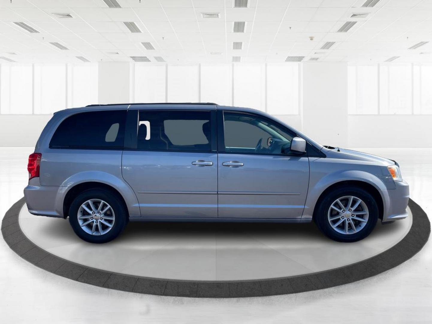 2014 Dodge Grand Caravan SXT (2C4RDGCG4ER) with an 3.6L V-6 DOHC engine, located at 1951 S Dayton Lakeview Rd., New Carlisle, OH, 45344, (937) 908-9800, 39.890999, -84.050255 - Photo#1