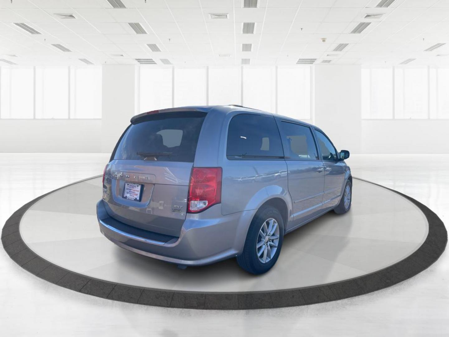 2014 Dodge Grand Caravan SXT (2C4RDGCG4ER) with an 3.6L V-6 DOHC engine, located at 1951 S Dayton Lakeview Rd., New Carlisle, OH, 45344, (937) 908-9800, 39.890999, -84.050255 - Photo#2