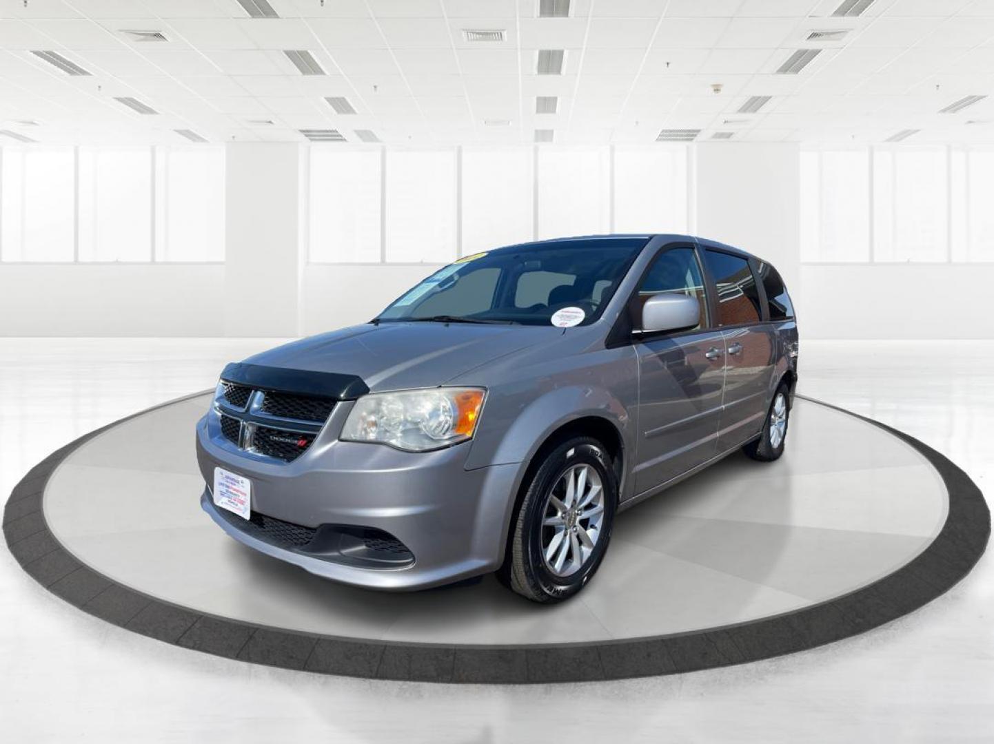 2014 Dodge Grand Caravan SXT (2C4RDGCG4ER) with an 3.6L V-6 DOHC engine, located at 1951 S Dayton Lakeview Rd., New Carlisle, OH, 45344, (937) 908-9800, 39.890999, -84.050255 - Photo#7