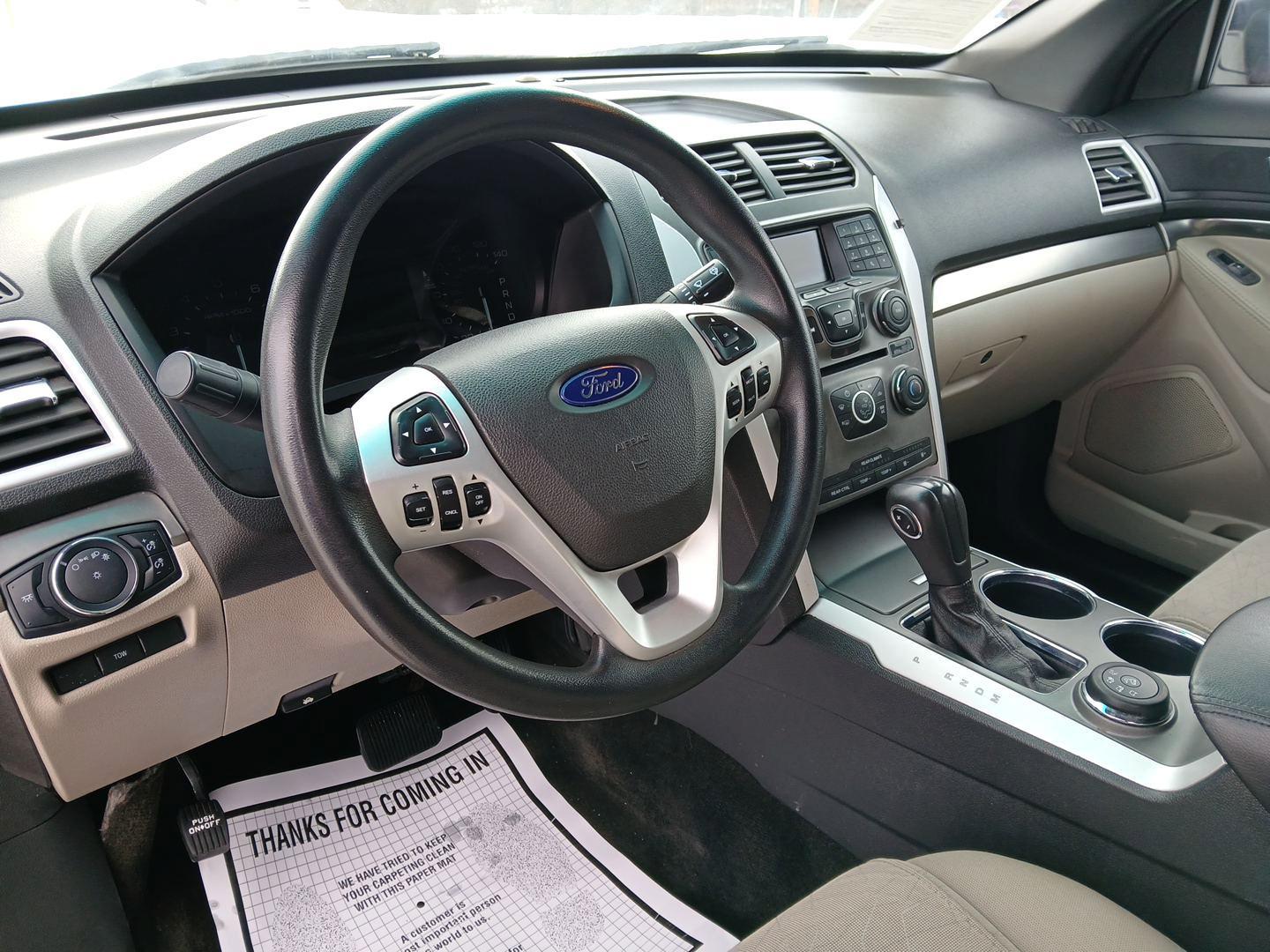 2014 Ruby Red Met Tinted CC Ford Explorer Base 4WD (1FM5K8B80EG) with an 3.5L V6 DOHC 24V engine, 6-Speed Automatic transmission, located at 401 Woodman Dr, Riverside, OH, 45431, (937) 908-9800, 39.761024, -84.120956 - Photo#8