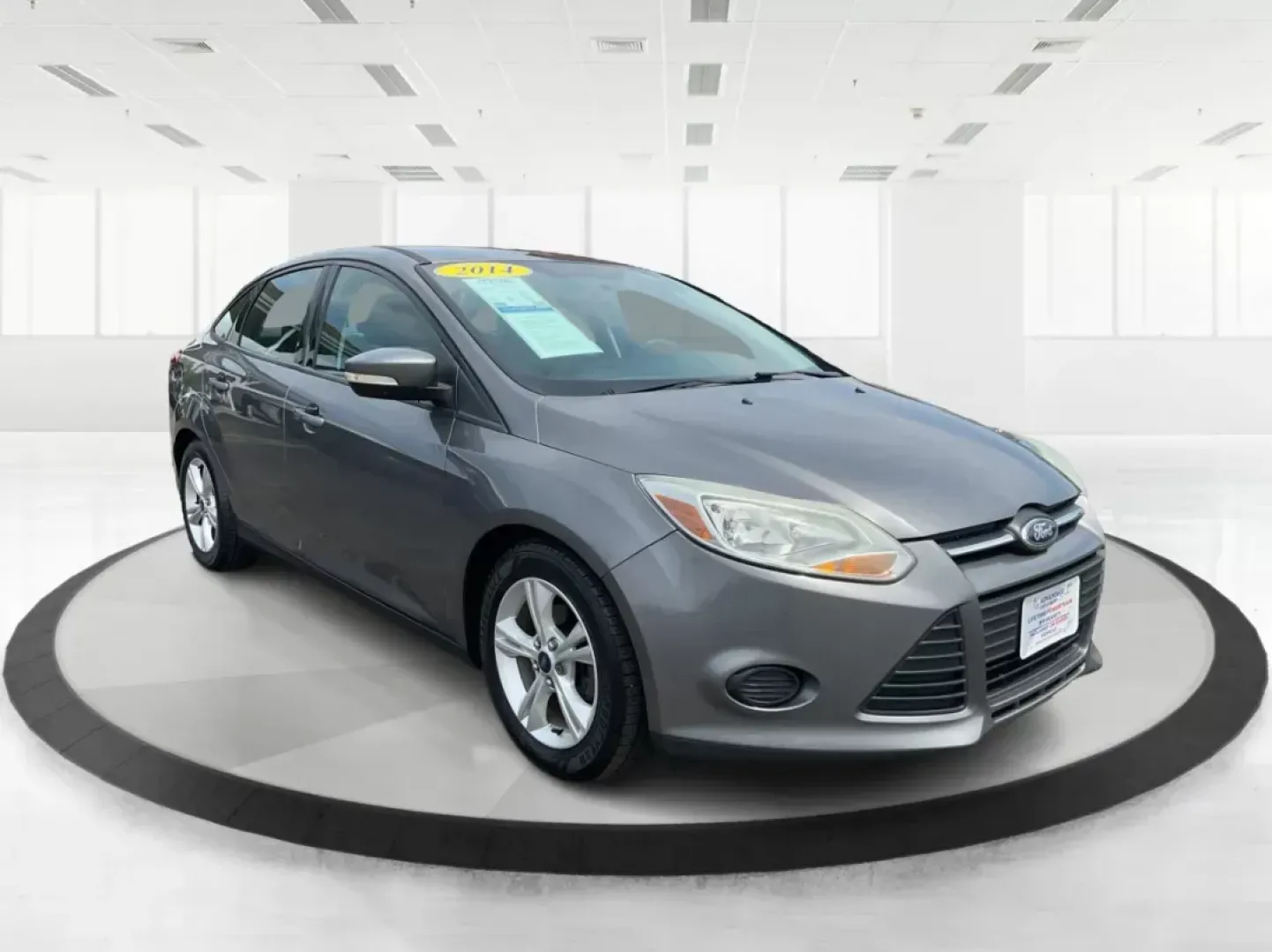 2014 Ford Focus SE (1FADP3F21EL) with an 2L I-4 gasoline direct injection engine, located at 1099 N County Rd 25A , Troy, OH, 45373, (937) 908-9800, 40.057041, -84.215462 - Photo#0
