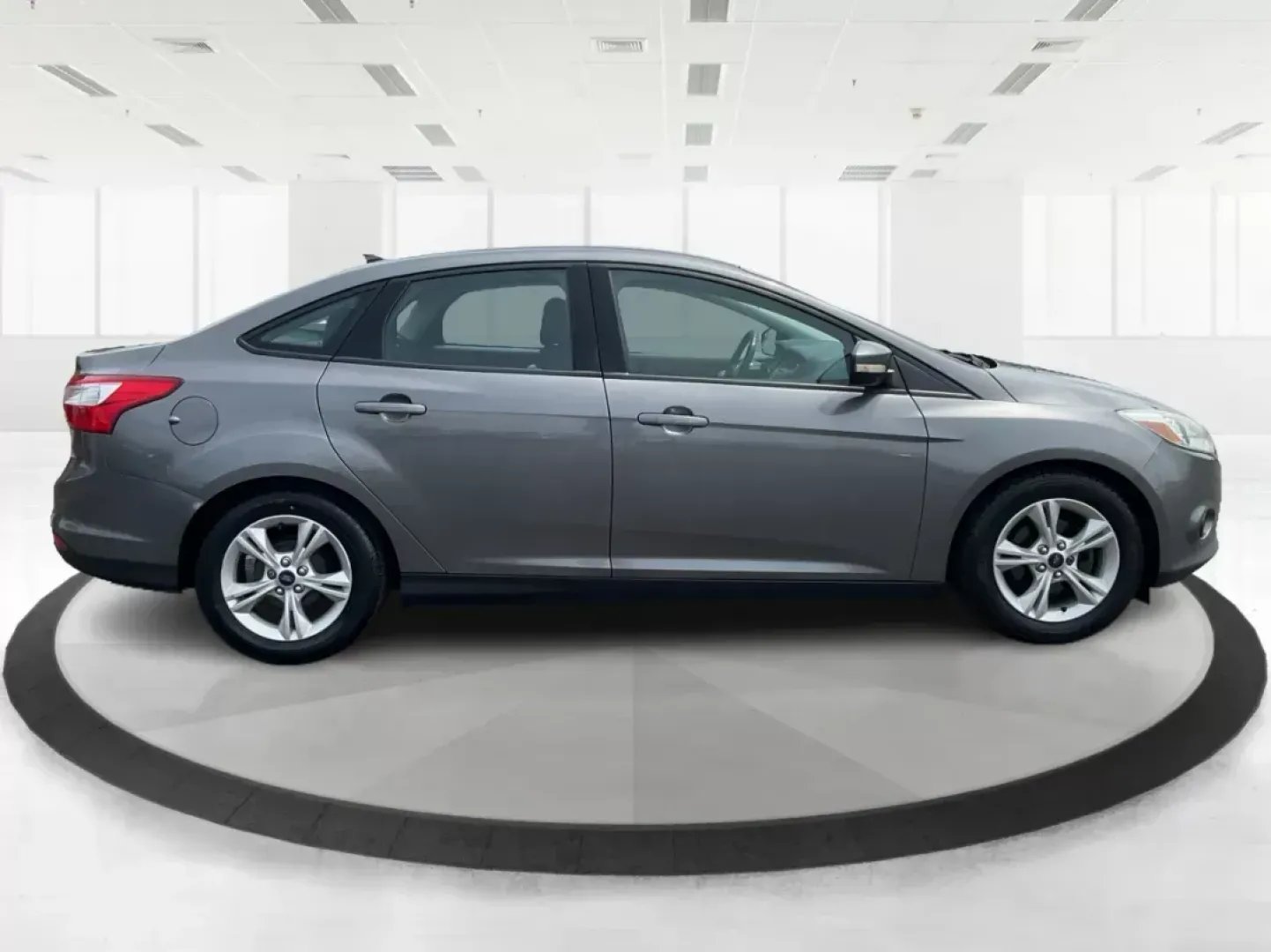 2014 Ford Focus SE (1FADP3F21EL) with an 2L I-4 gasoline direct injection engine, located at 1099 N County Rd 25A , Troy, OH, 45373, (937) 908-9800, 40.057041, -84.215462 - Photo#1